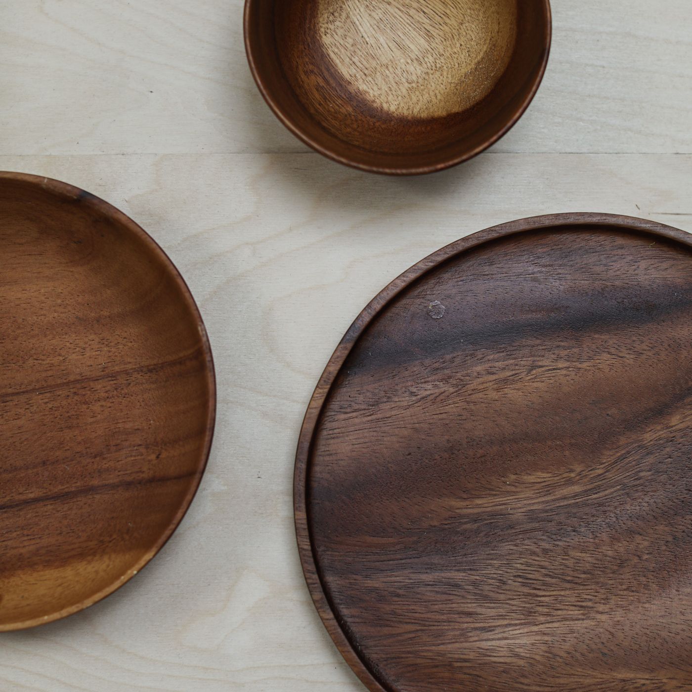 A plain white bowl photographed indoors in soft natural light.
